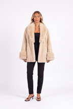 Oversized faux fur open-front coat in Beige — front